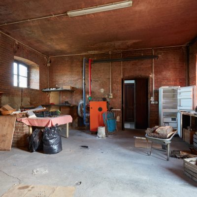 Messy,Basement,With,Red,Bricks,Walls,In,Old,Country,House