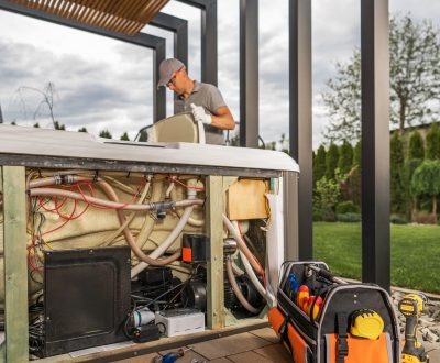 A,Technician,Inspects,And,Repairs,The,Inner,Workings,Of,A